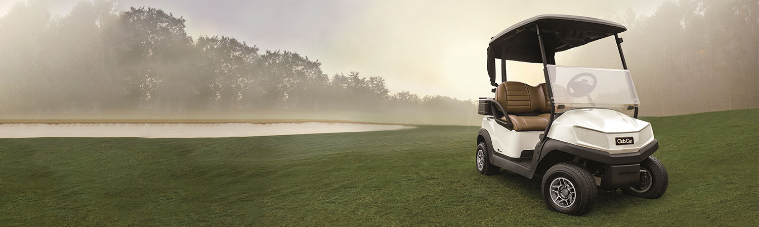 golf cart by a lake